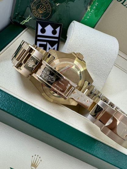 Rolex GMT-Master II / Gold Green